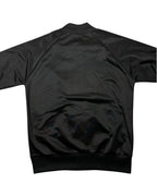 Casual Circuit. Fred Perry argyle track jacket, black, polyester, with a full-length zip and ribbed cuffs.