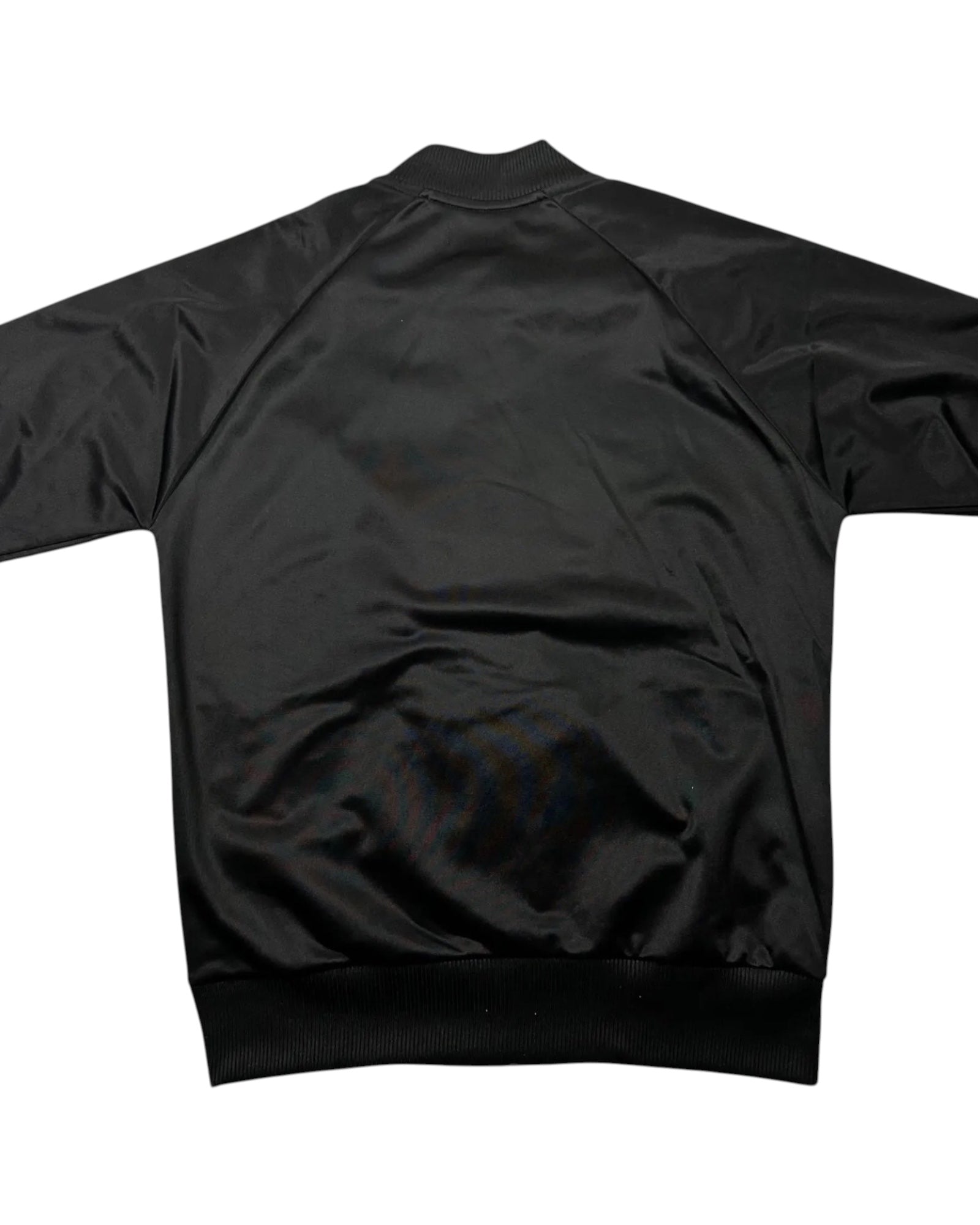 Casual Circuit. Fred Perry argyle track jacket, black, polyester, with a full-length zip and ribbed cuffs.