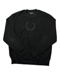 Casual Circuit. Black Fred Perry jumper with a laurel wreath logo on the chest, crew neck and ribbed cuffs.
