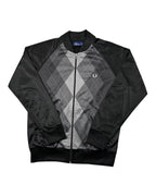 Casual Circuit. Fred Perry argyle track jacket in grey and black, 100% polyester, with a full-length zip and ribbed cuffs.