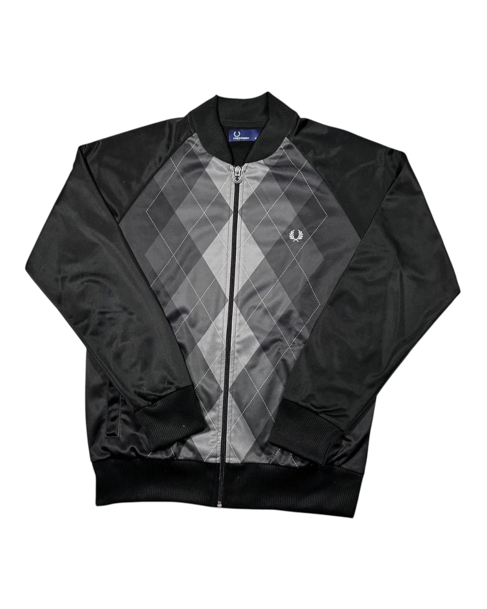Casual Circuit. Fred Perry argyle track jacket in grey and black, 100% polyester, with a full-length zip and ribbed cuffs.